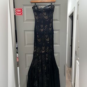 Women’s long black and nude dress